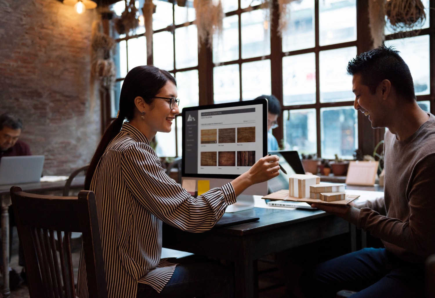 Man cooking in kitchen with moody lighting