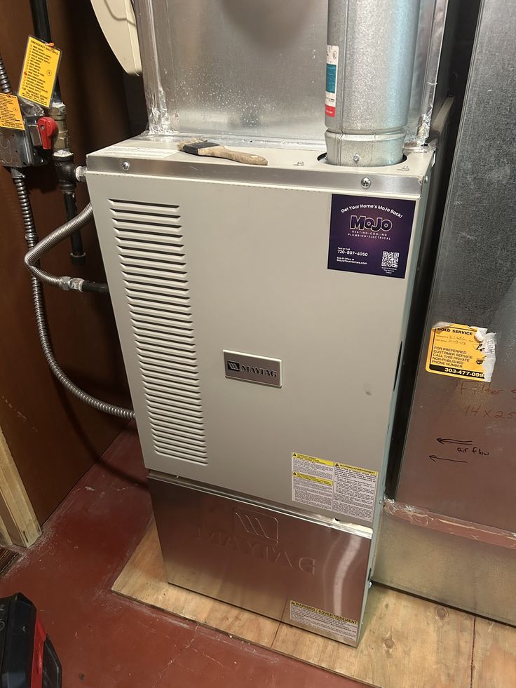 Brian and Hunter with MoJo Home Service truck in the background
