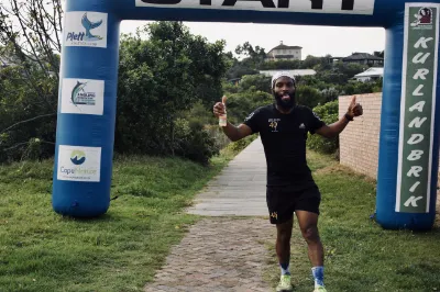 Runners crosses the finish live at the Robberg Express 2025