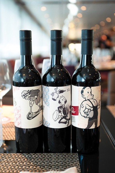 Outdoor bride and groom portrait underneath a garden arbor at Riverwood Mansion in Nashville, Tennessee.