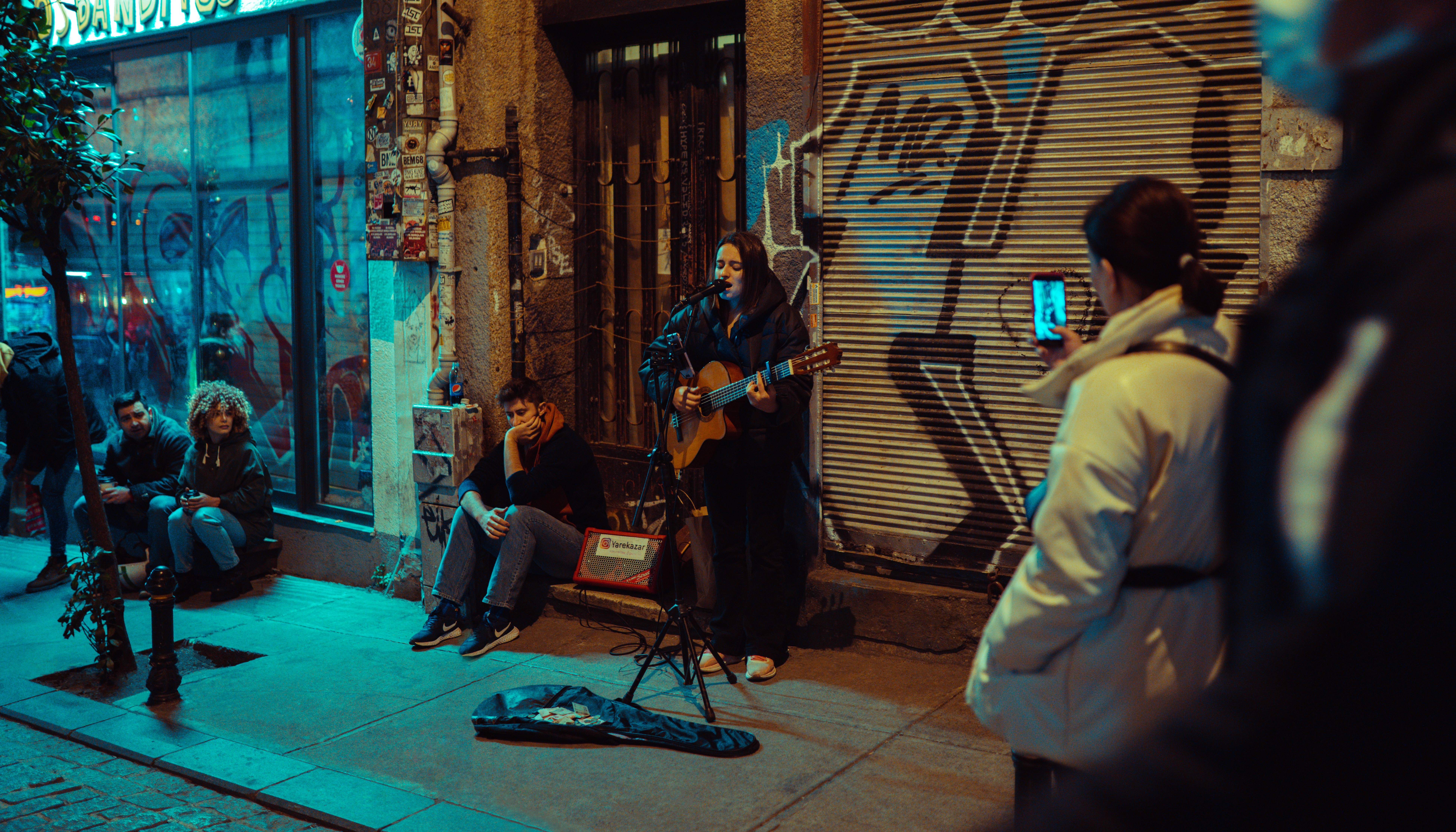 Street singers with some crowd - different voice types