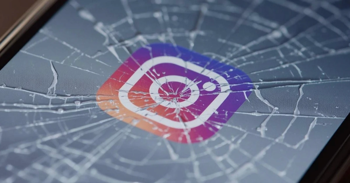 Cracked smartphone displaying a frozen Instagram app screen