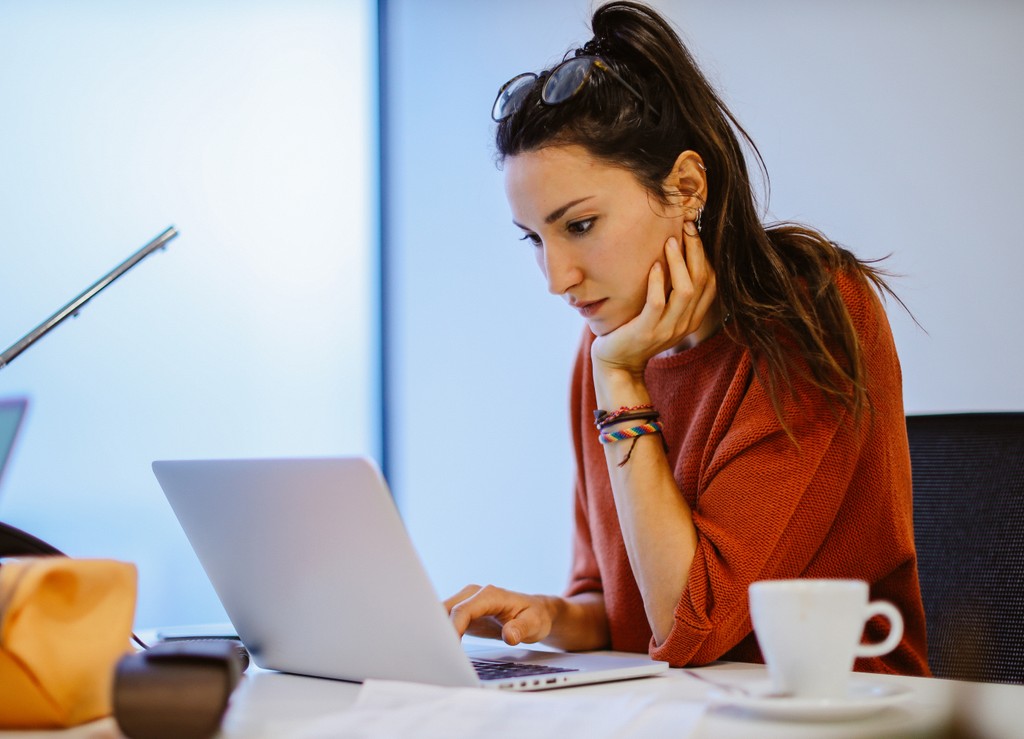 Financial Analyst reviewing data