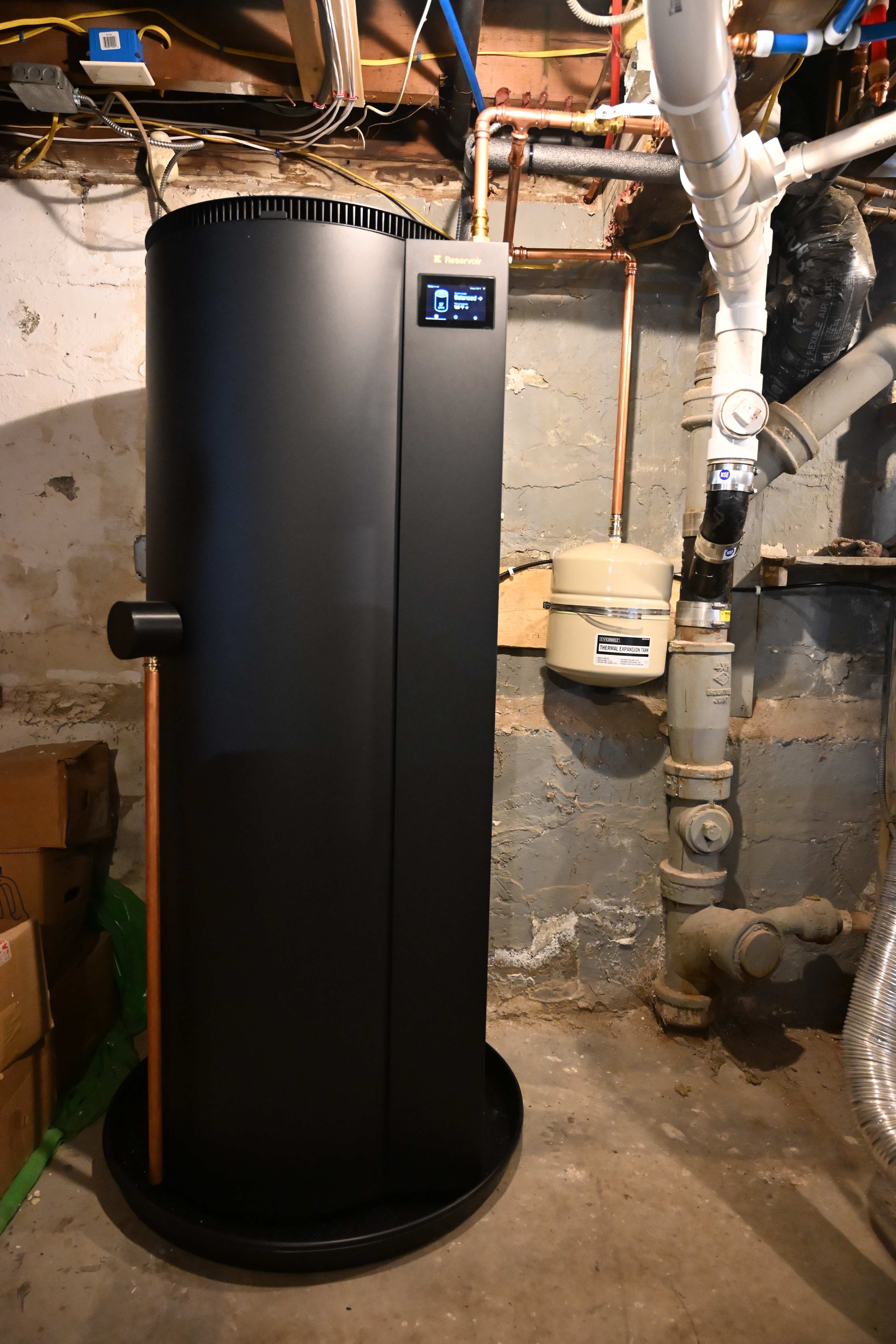 Reservoir smart water heater in basement 