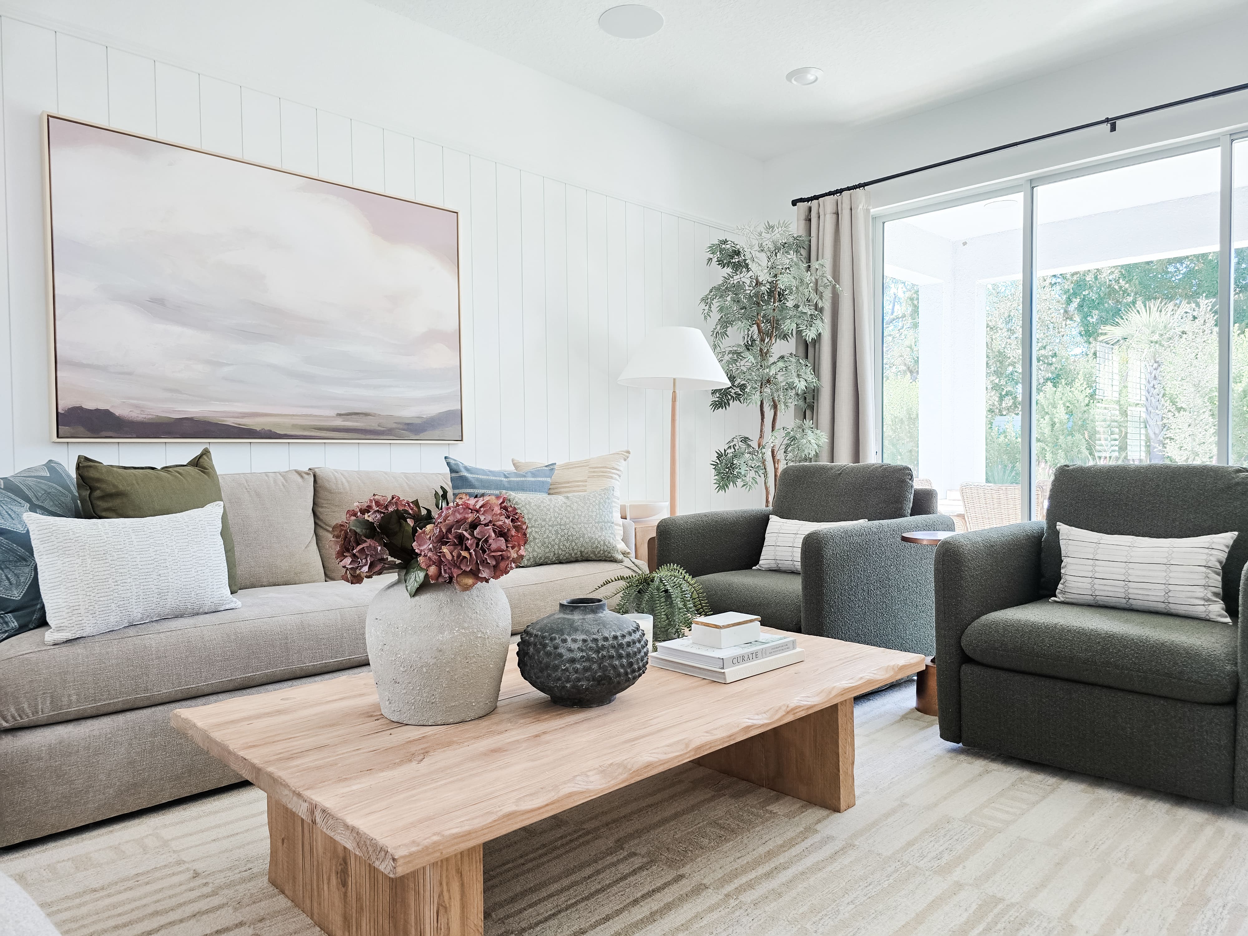 a laptop computer sitting on top of a white chair