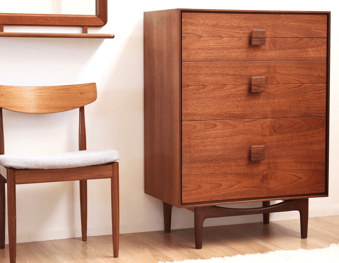 Mid-century wooden chair and chest of drawers.