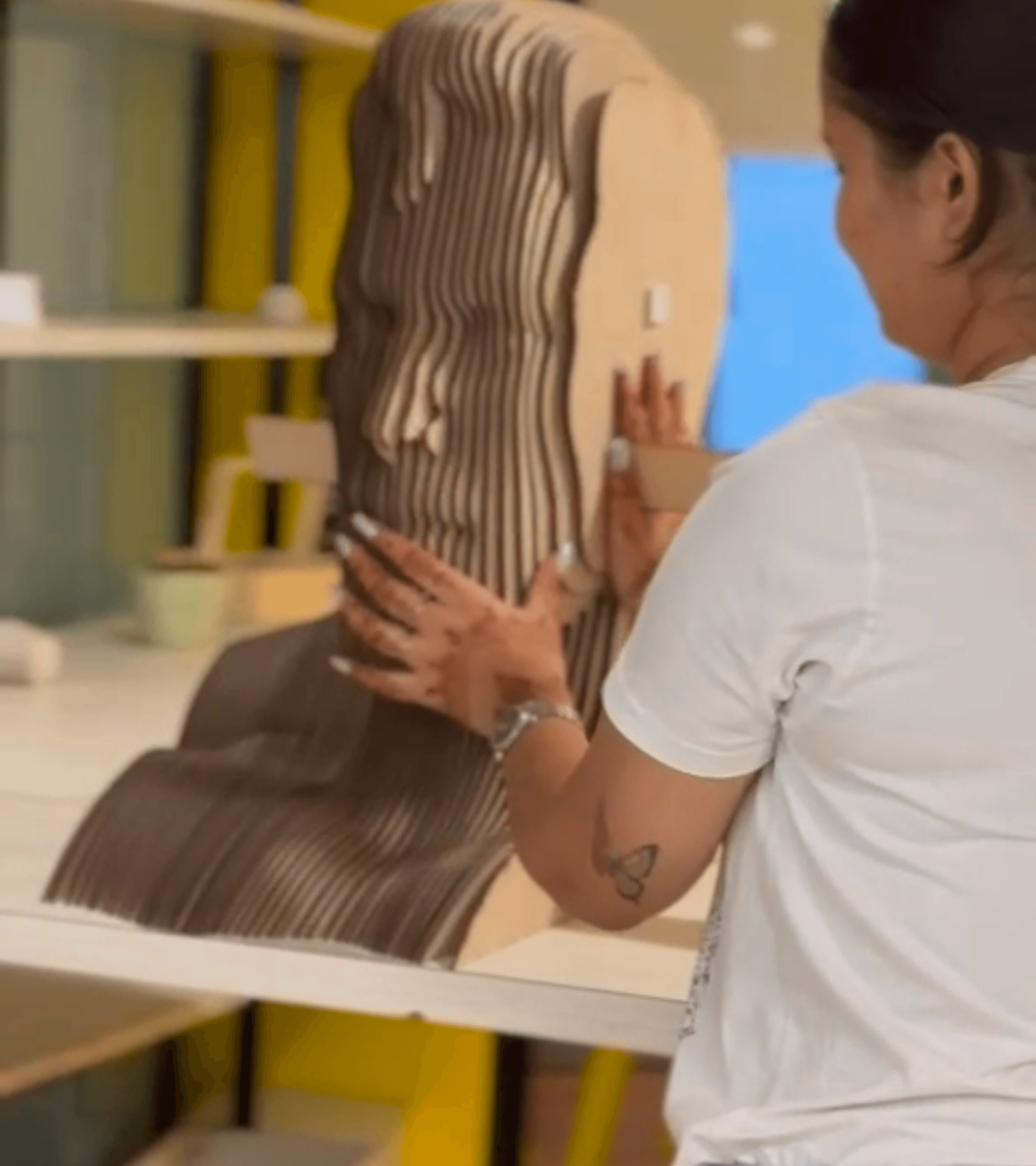 Phone showing Bloomy UI