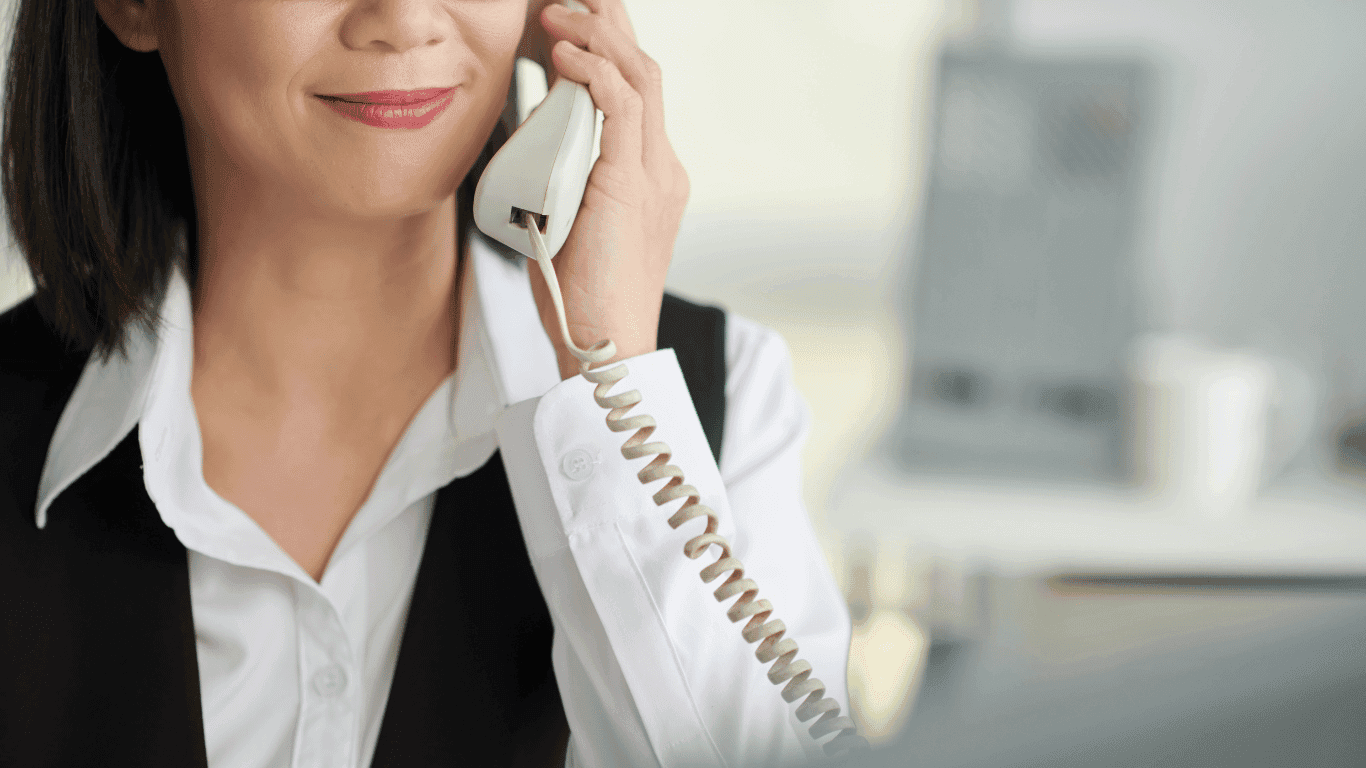 Photo of a female sales representative on the phone