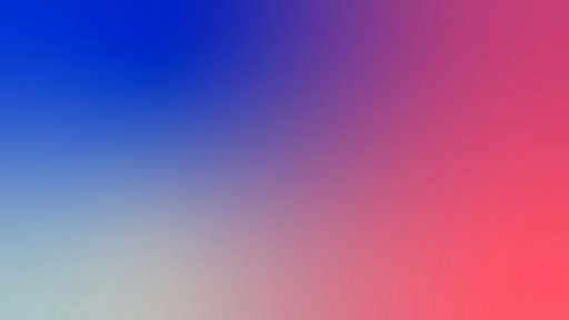 a blurry image of a red, blue, and pink background
