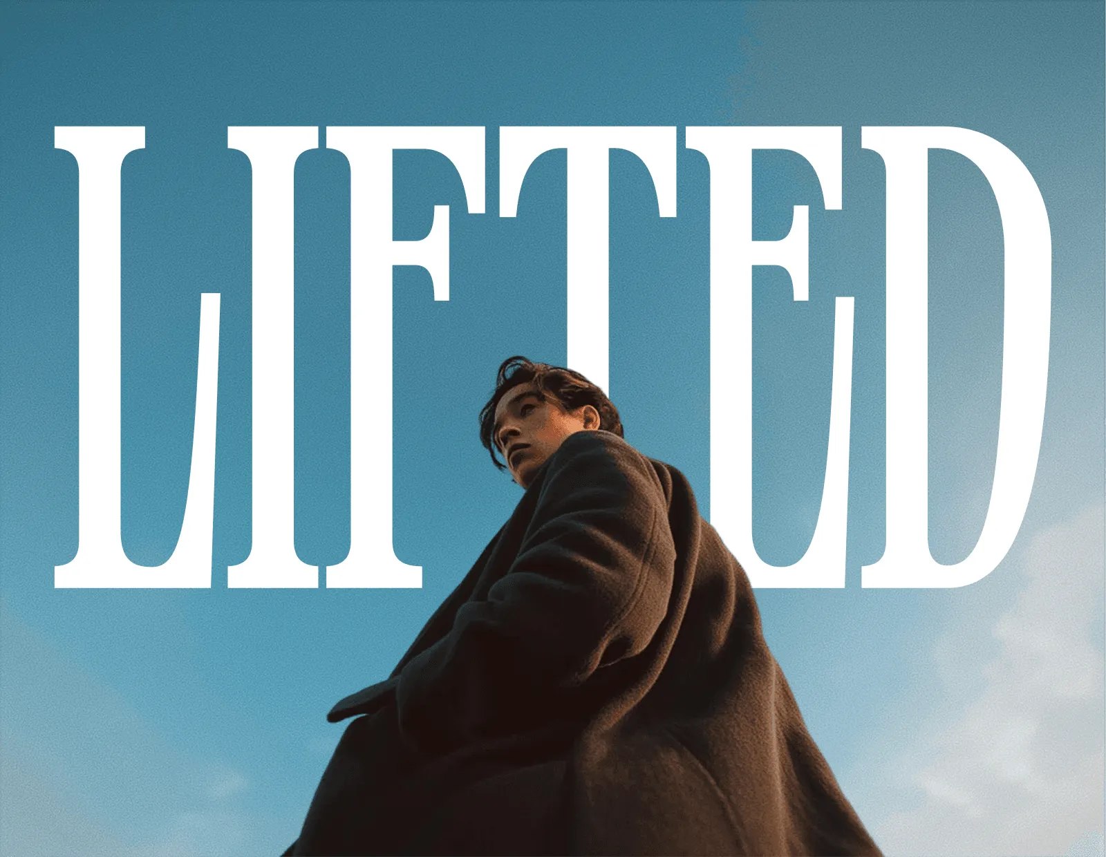 A silhouette of a person standing under the word "LIFTED," against a bright sky.