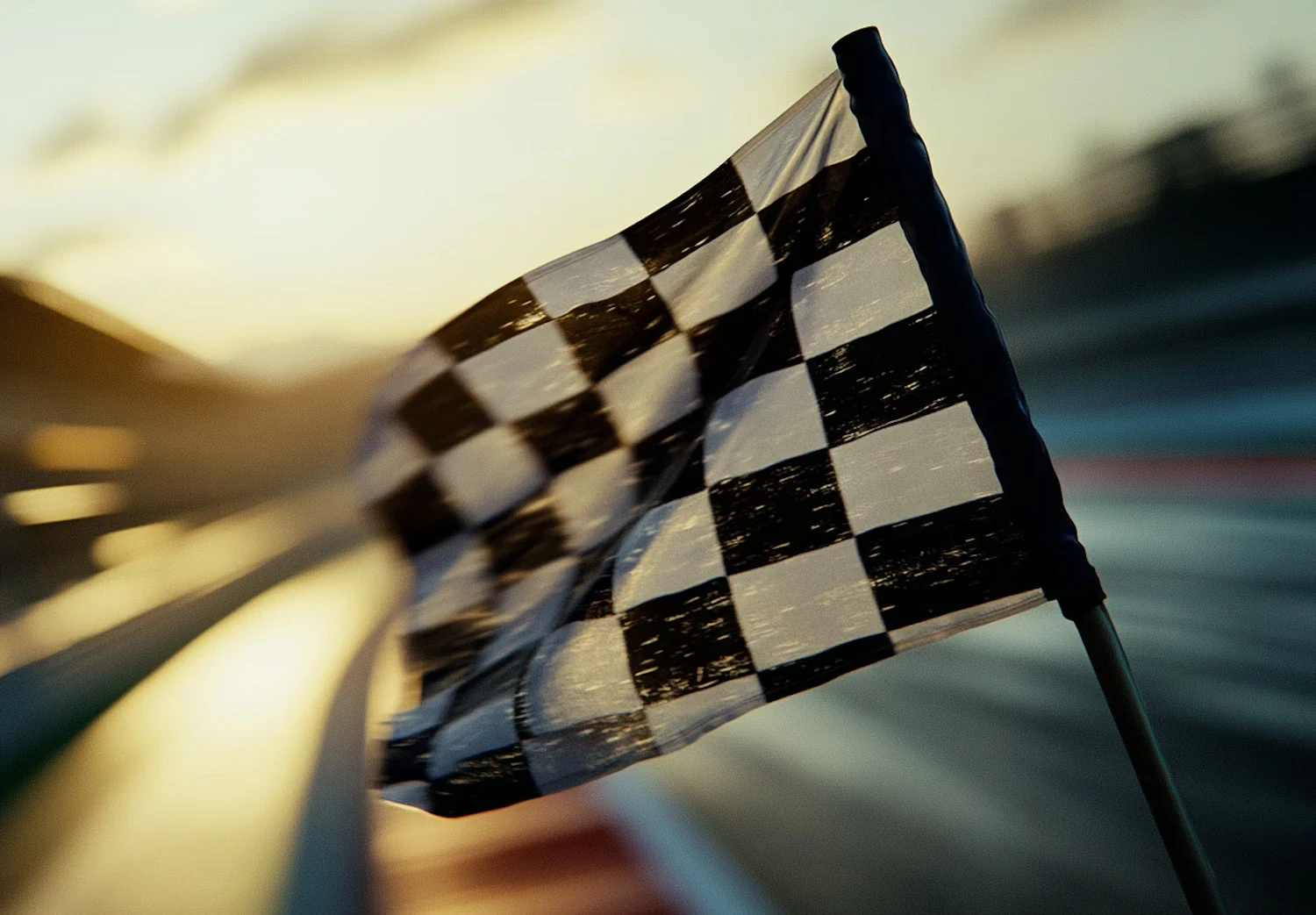 Checkered flag at race track.