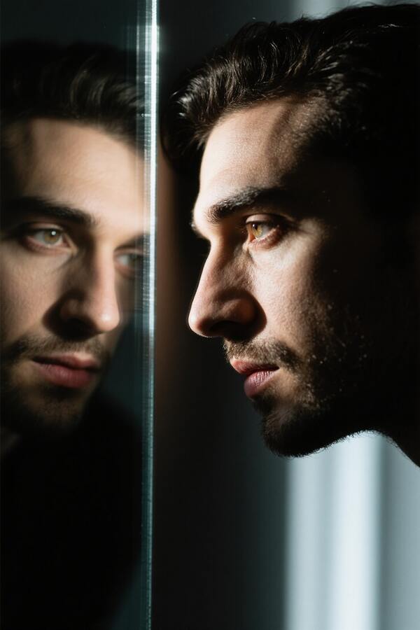 Man Gazing at Reflection