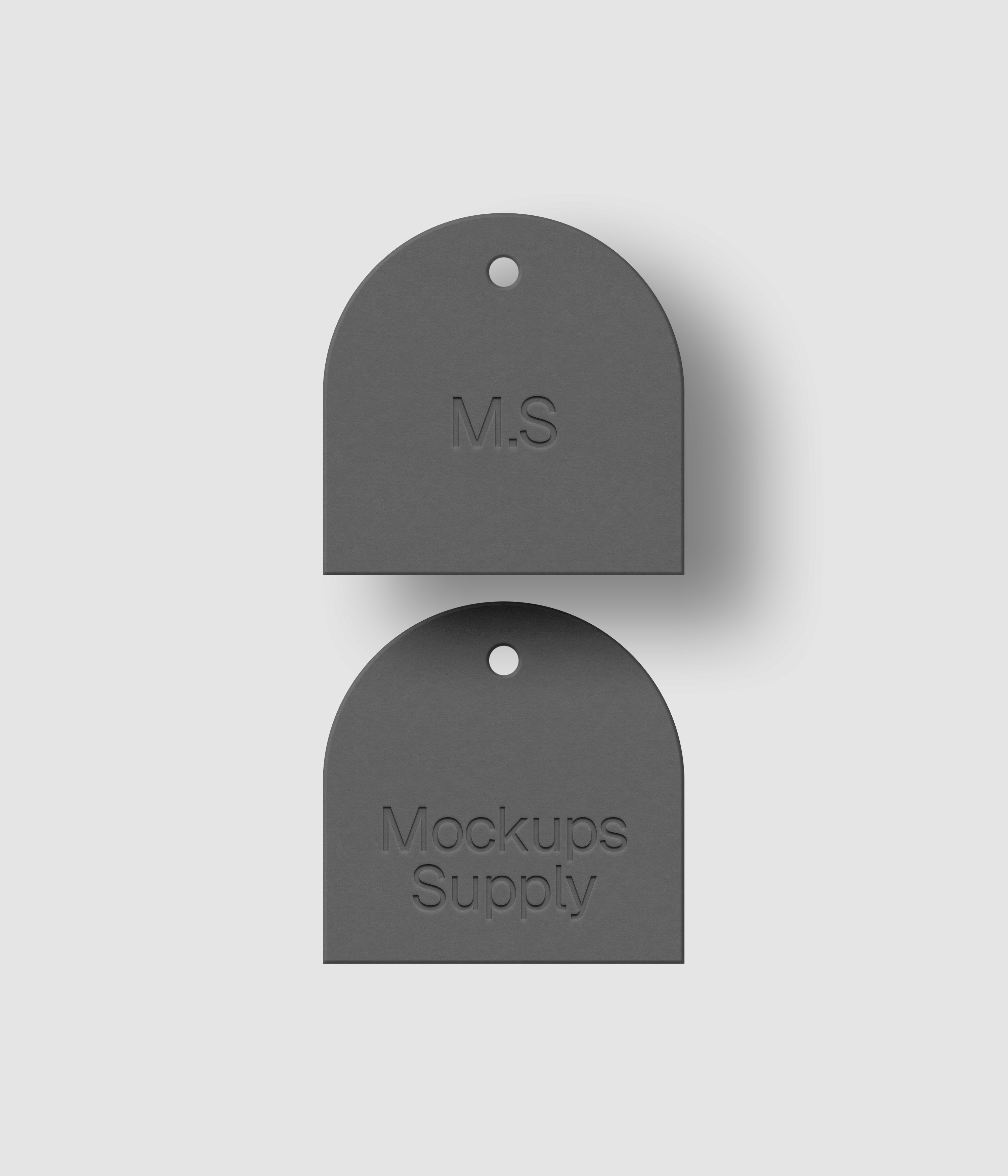 Pair of white arched top square tags featuring embossed logo with customizable shadow and colors on dark backdrop for branding