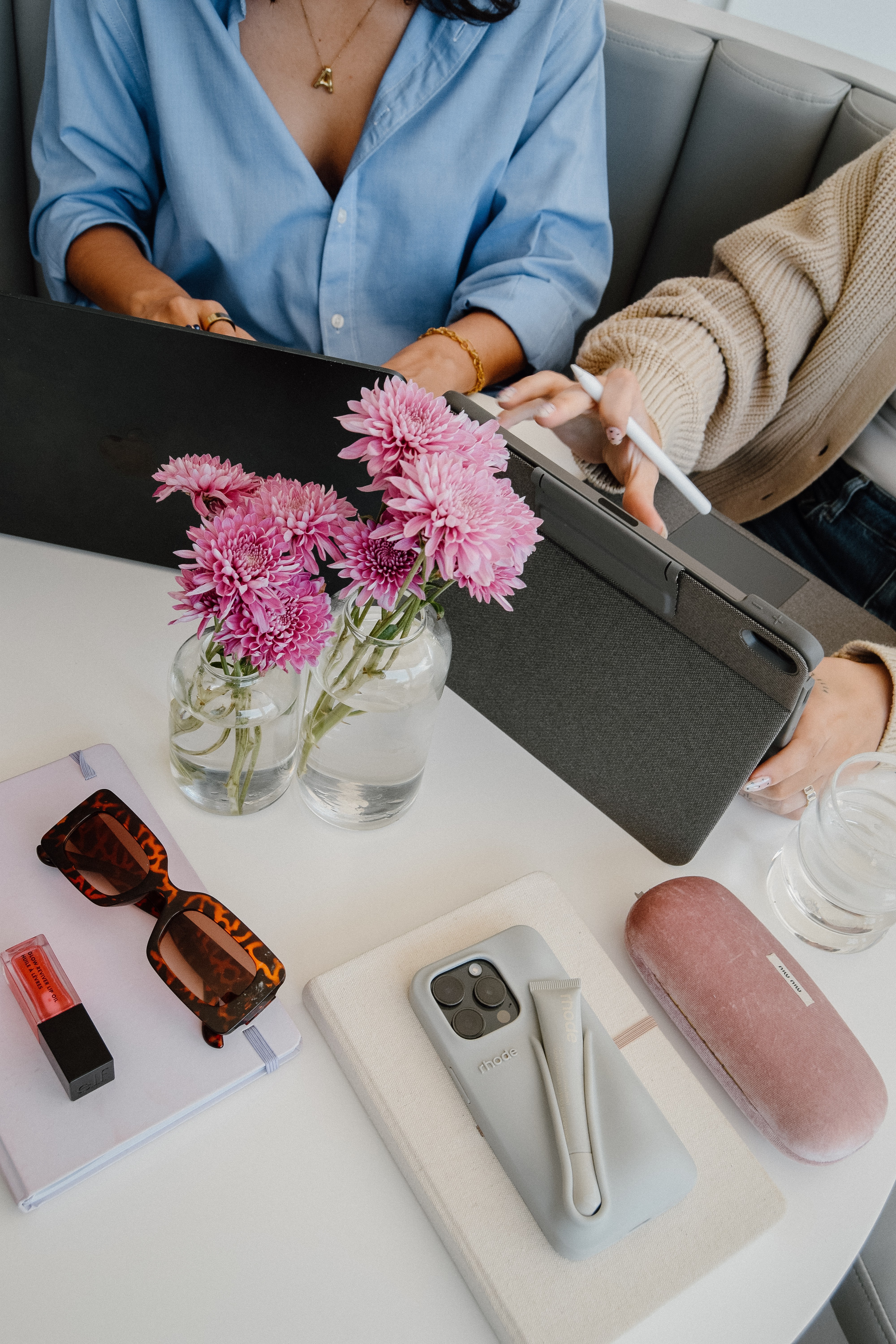 Photo of two ladies having a meeting with their iPads