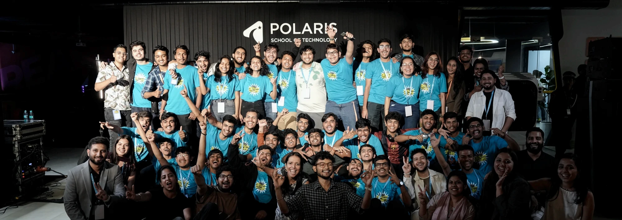 a group of people walking down a hallway