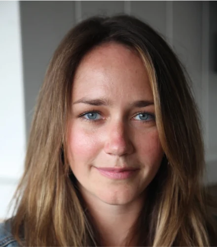 Elizabeth Gansen VP of Operations and Founder shapes Artium's culture, focusing on fulfillment and inclusivity, and forging key non-profit partnerships, embodying the company's spirit and its thriving creative space.