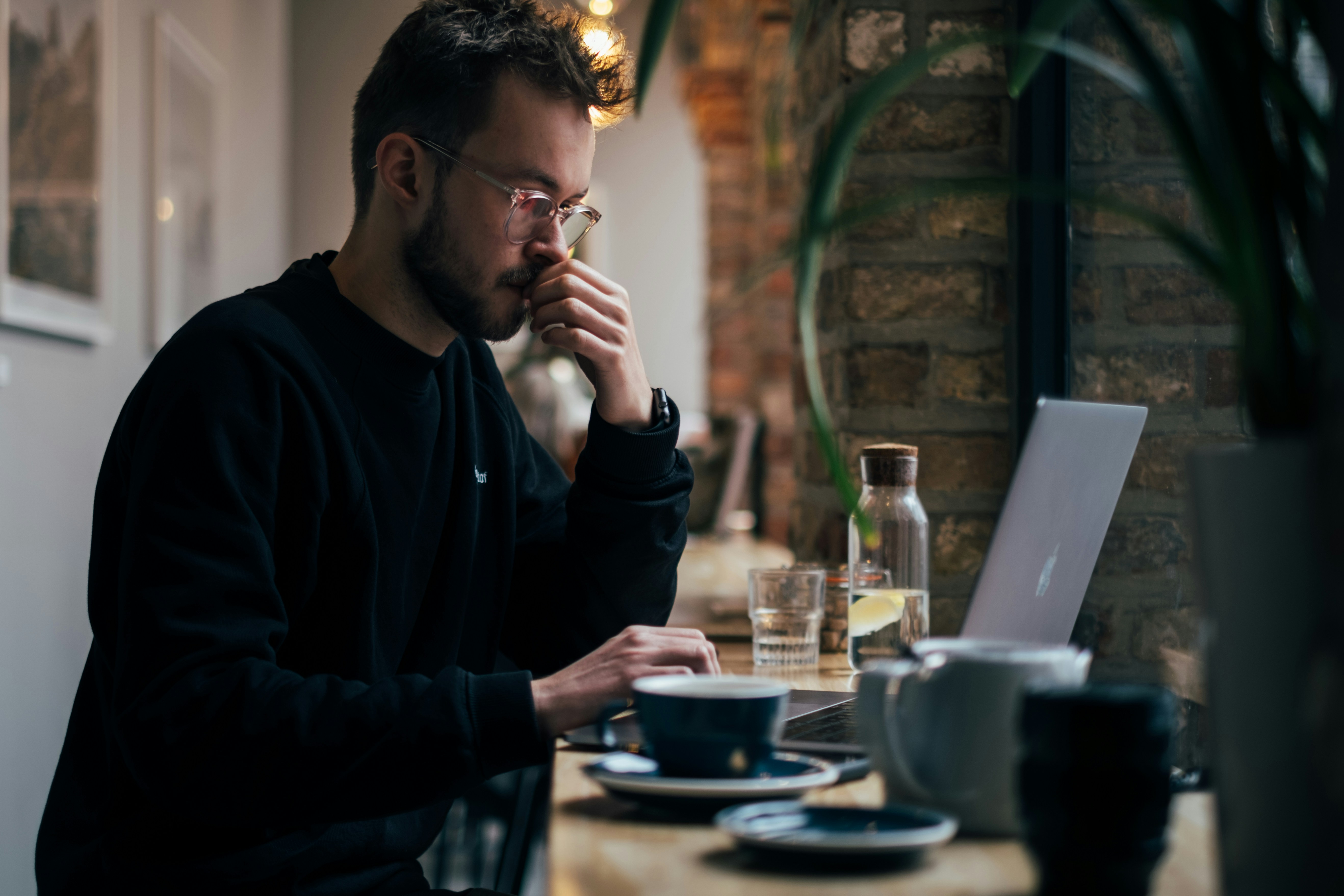 person infront of laptop - How To Read Research Papers