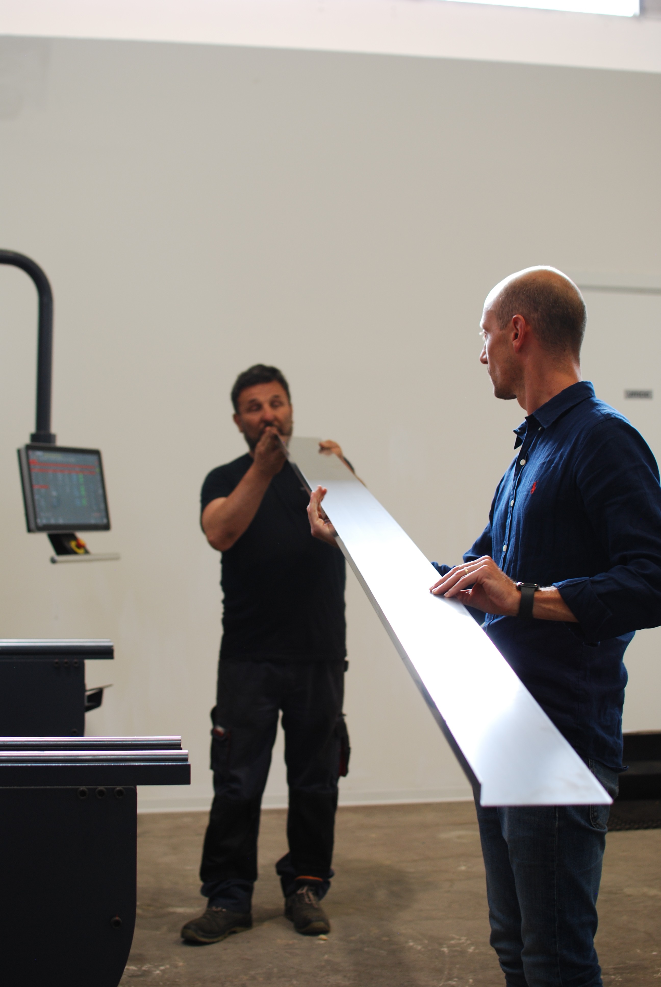 Welding sparks illuminate the darkness.