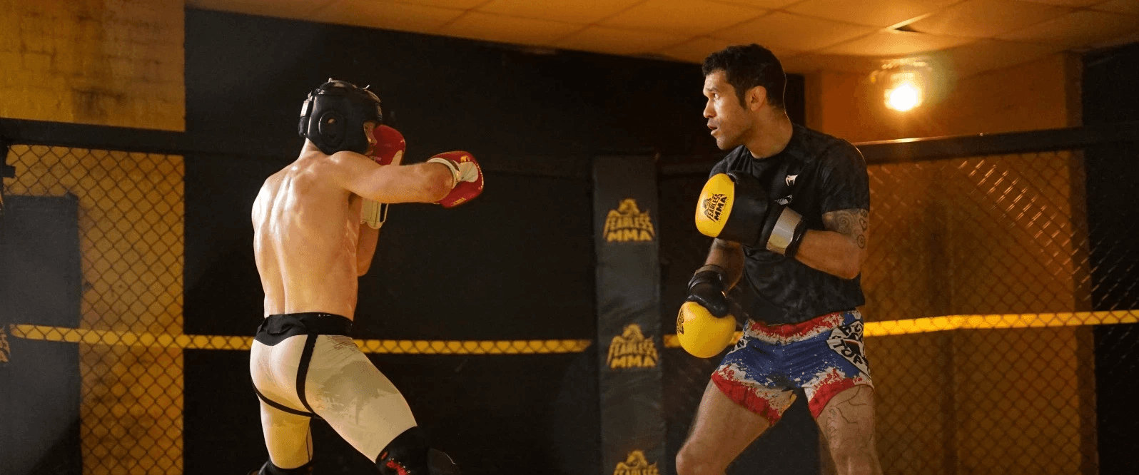Boxer working the pads in a boxing class at Fearless MMA