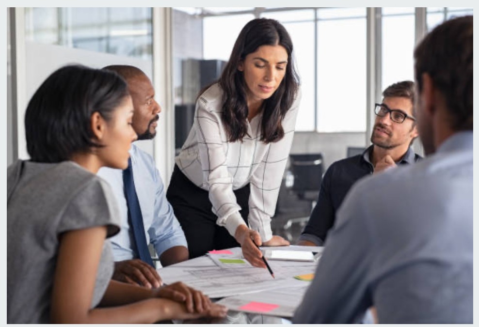 person sitting in a chair in front of a man