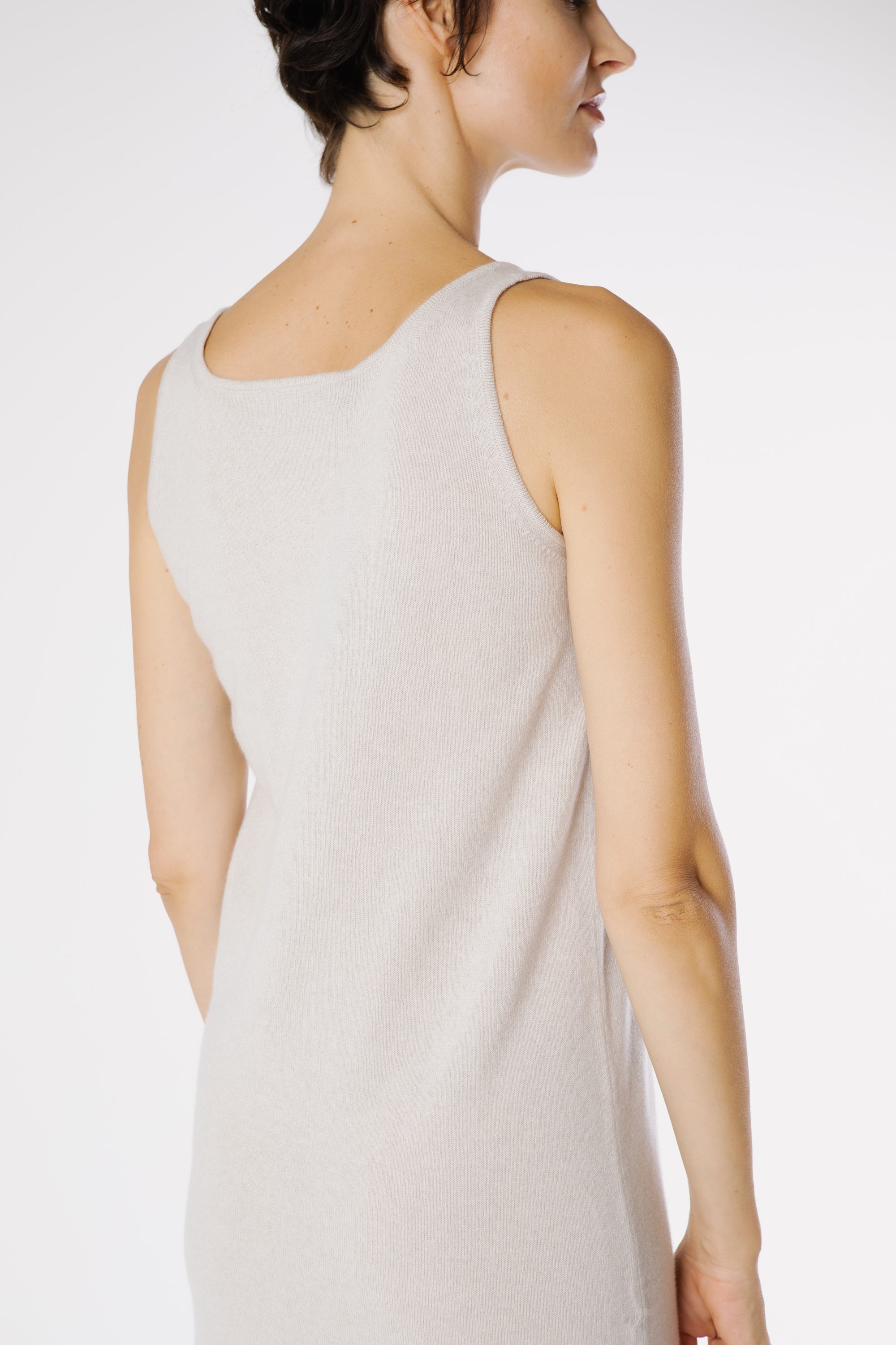 Side profile of the Hamlet Cashmere Dress Silk revealing its flattering straight cut and soft cashmere-silk texture.