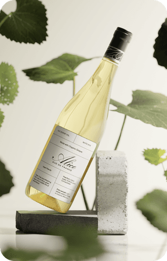 White wine bottle, tilted, on stone podium decorated with plants