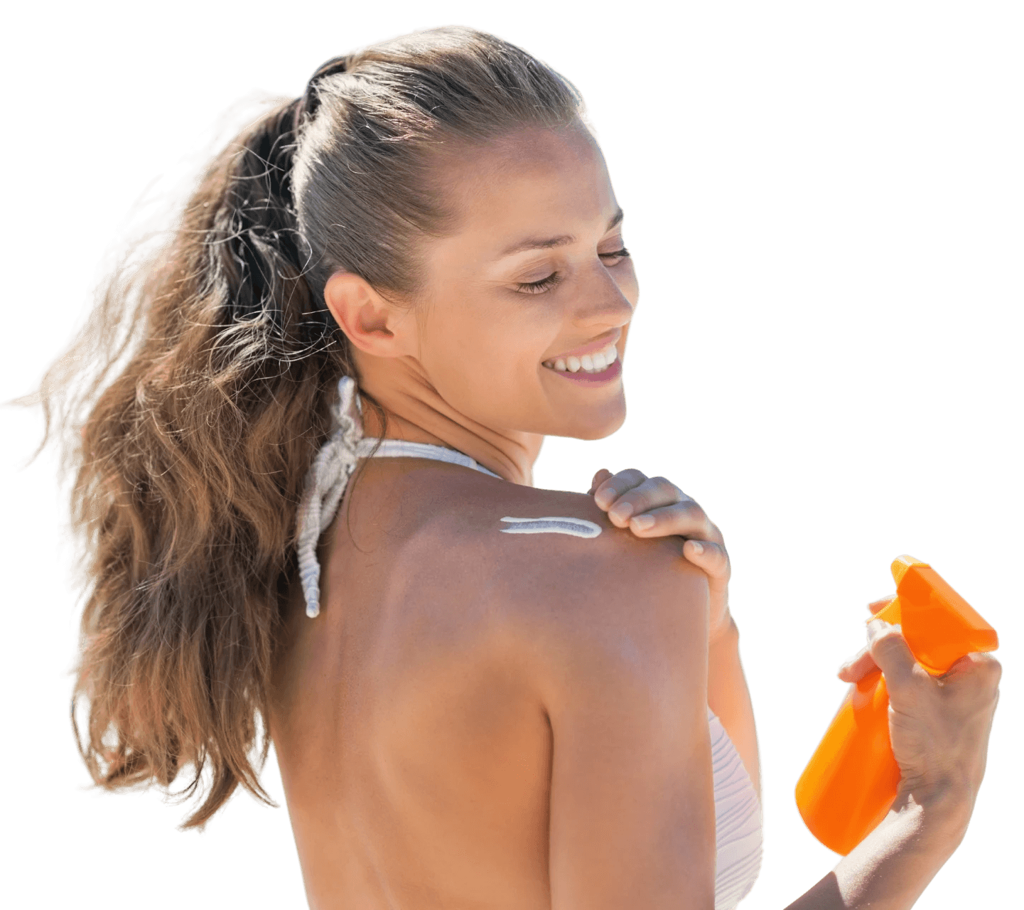 Happy young woman applying sun screen cream