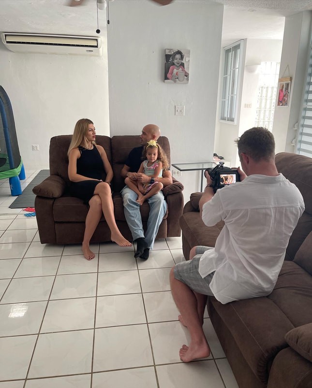 Family being interviewed on camera for Puerto Ricans on the Rise documentary