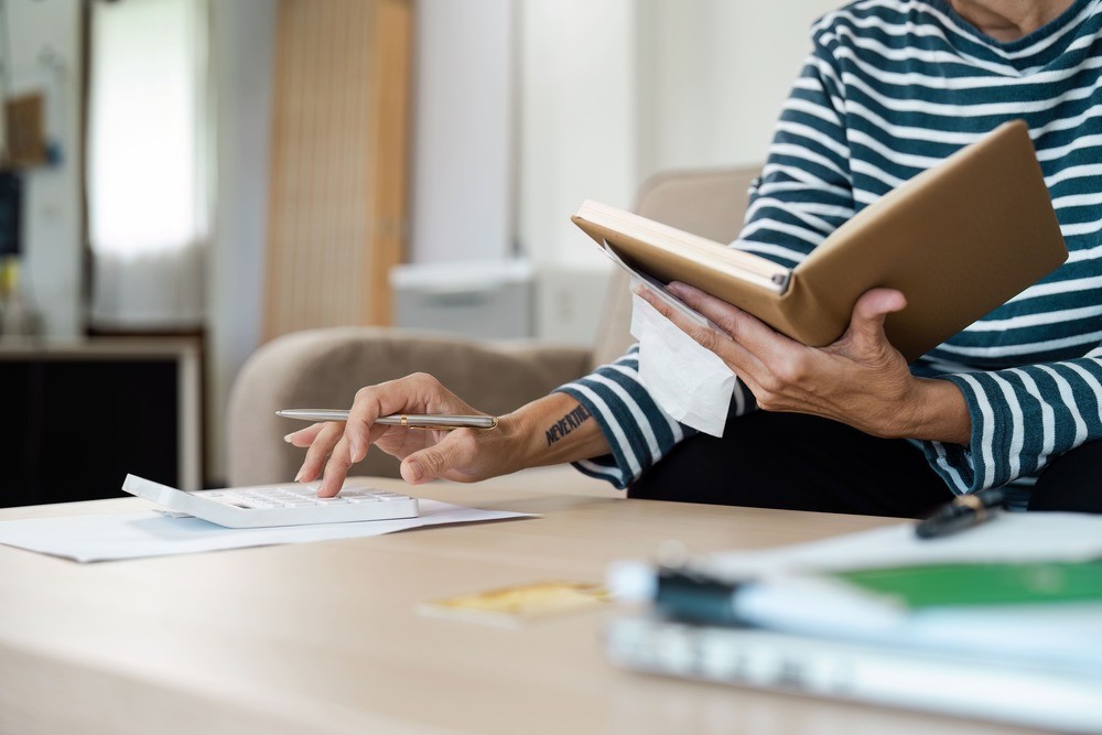 senior adult managing paperwork