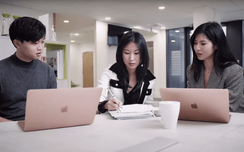 business women reading document