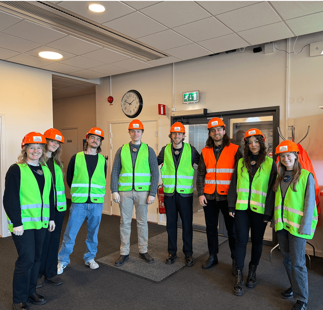 Group members wearing reflective vests, taken from the site visit at renova recycling.