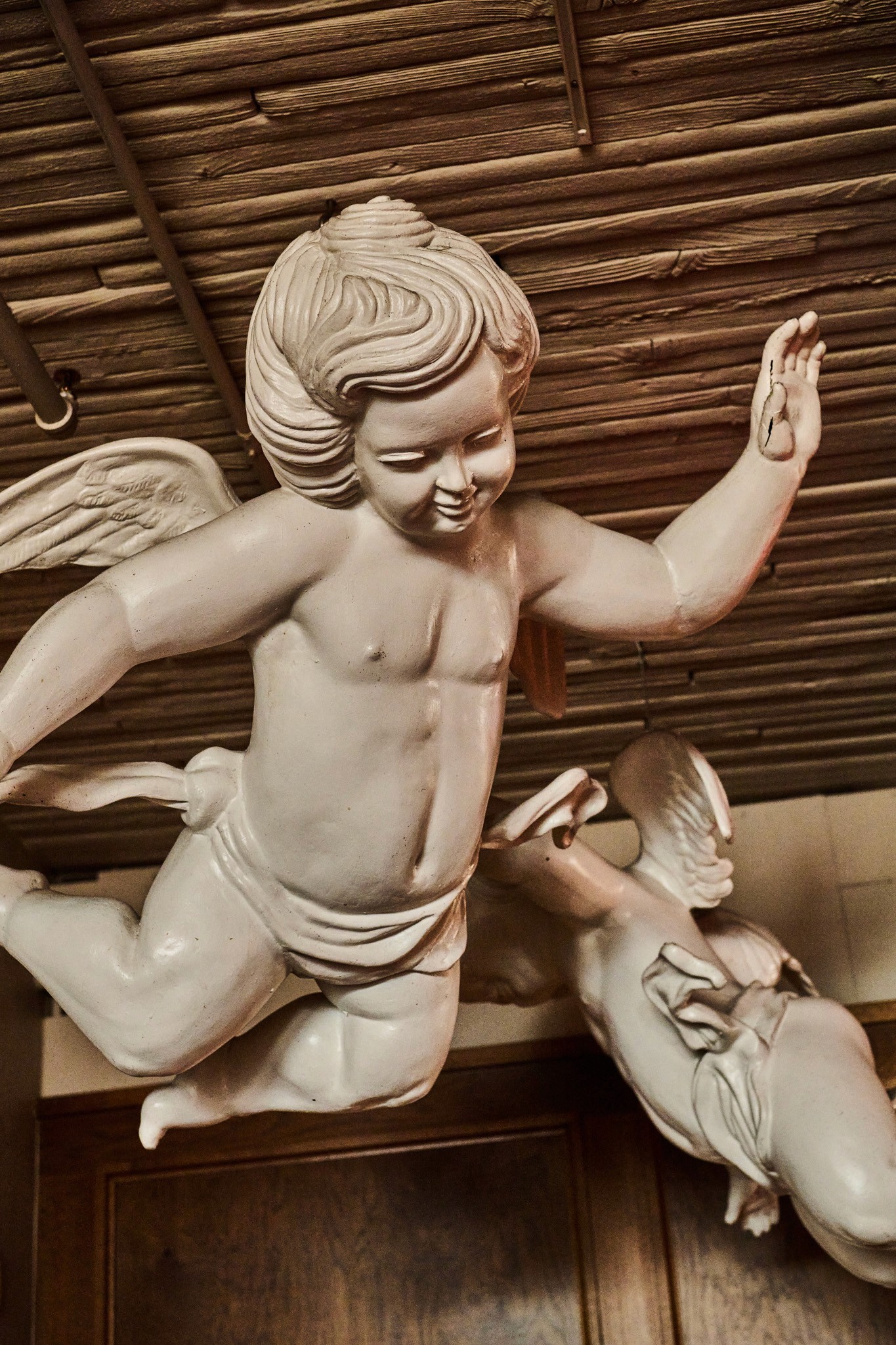 Cherubs hanging from the ceiling