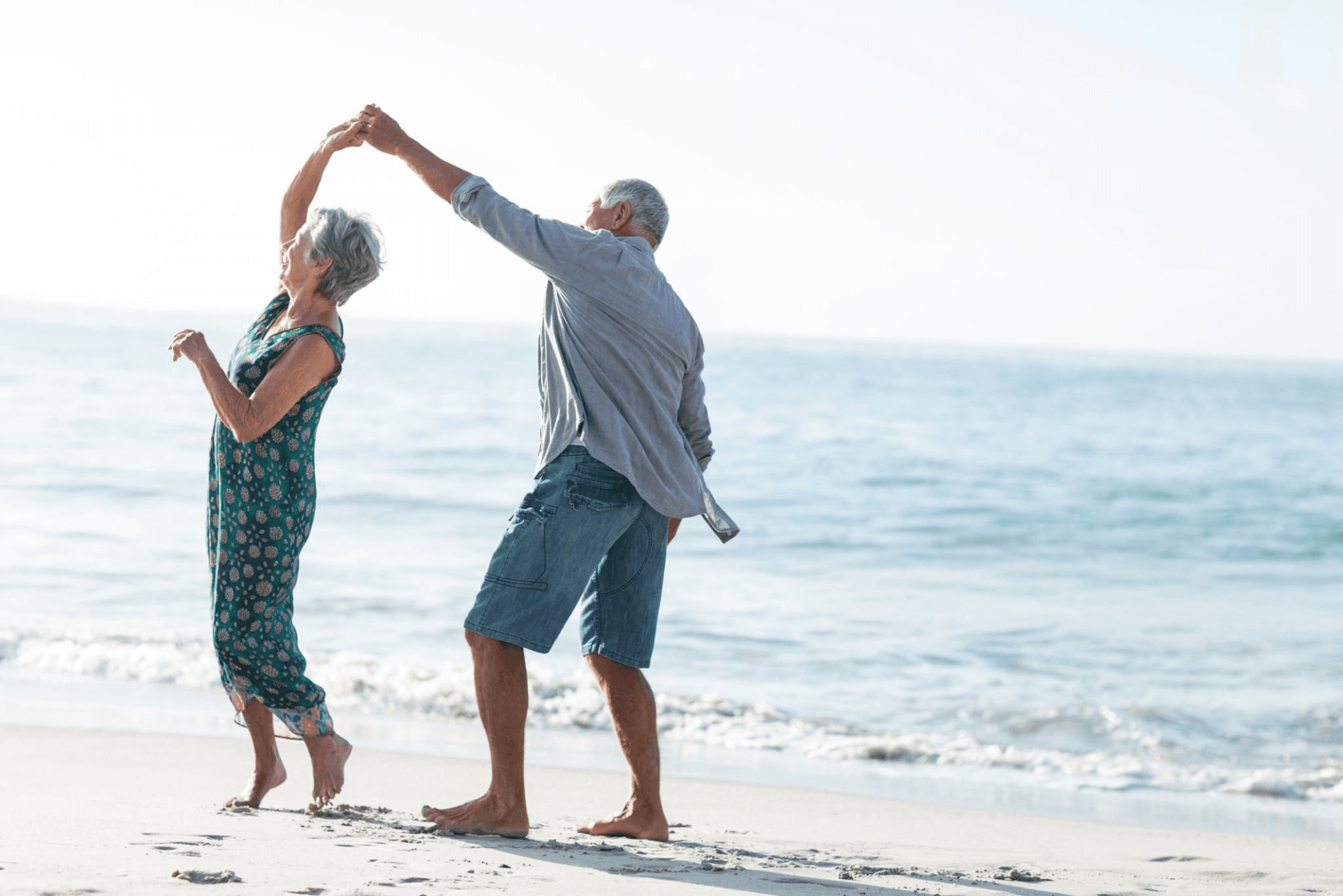a man holding a wallet and a watch