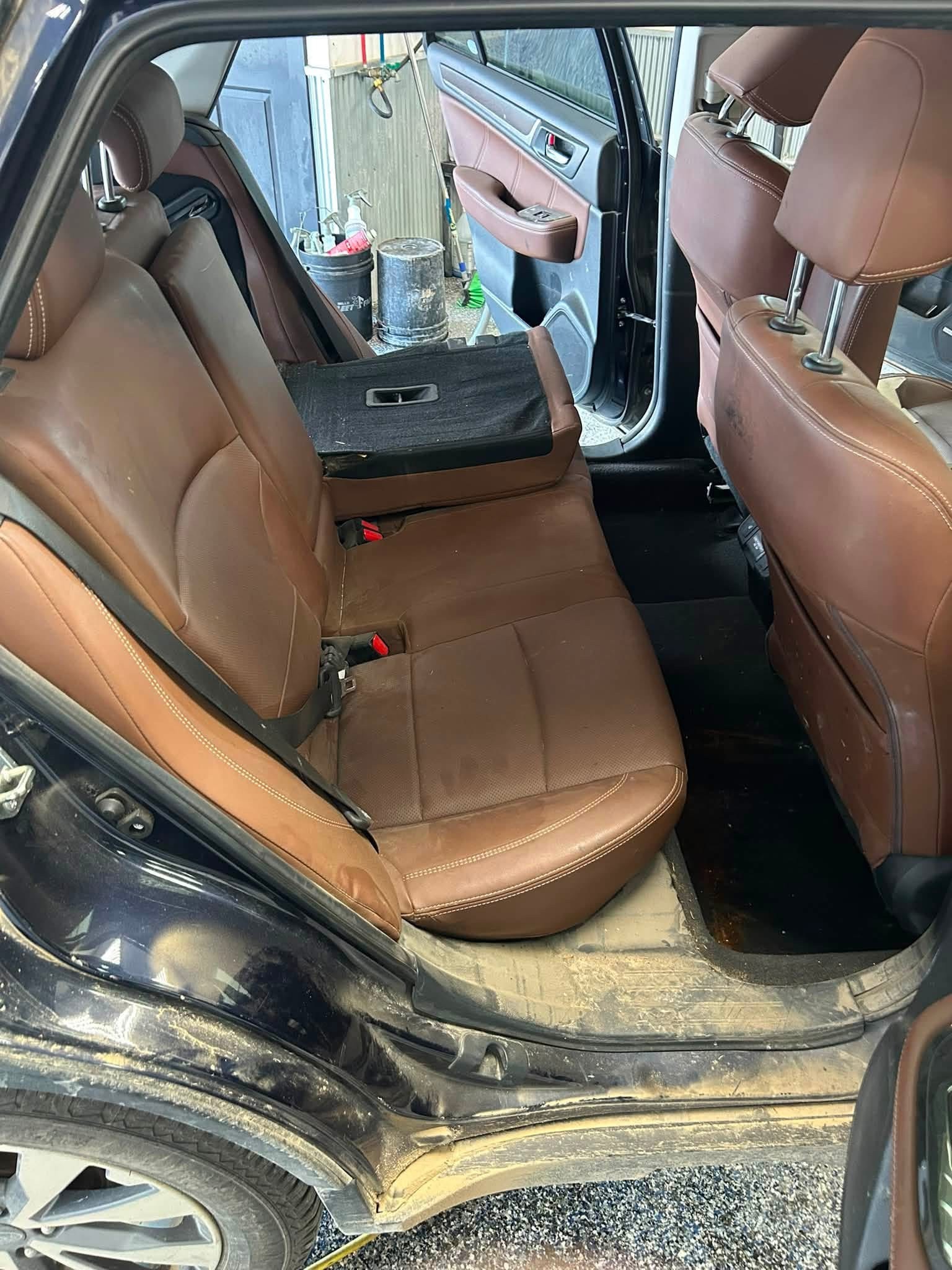 Rear seat before RJ's Detailing cleaned it