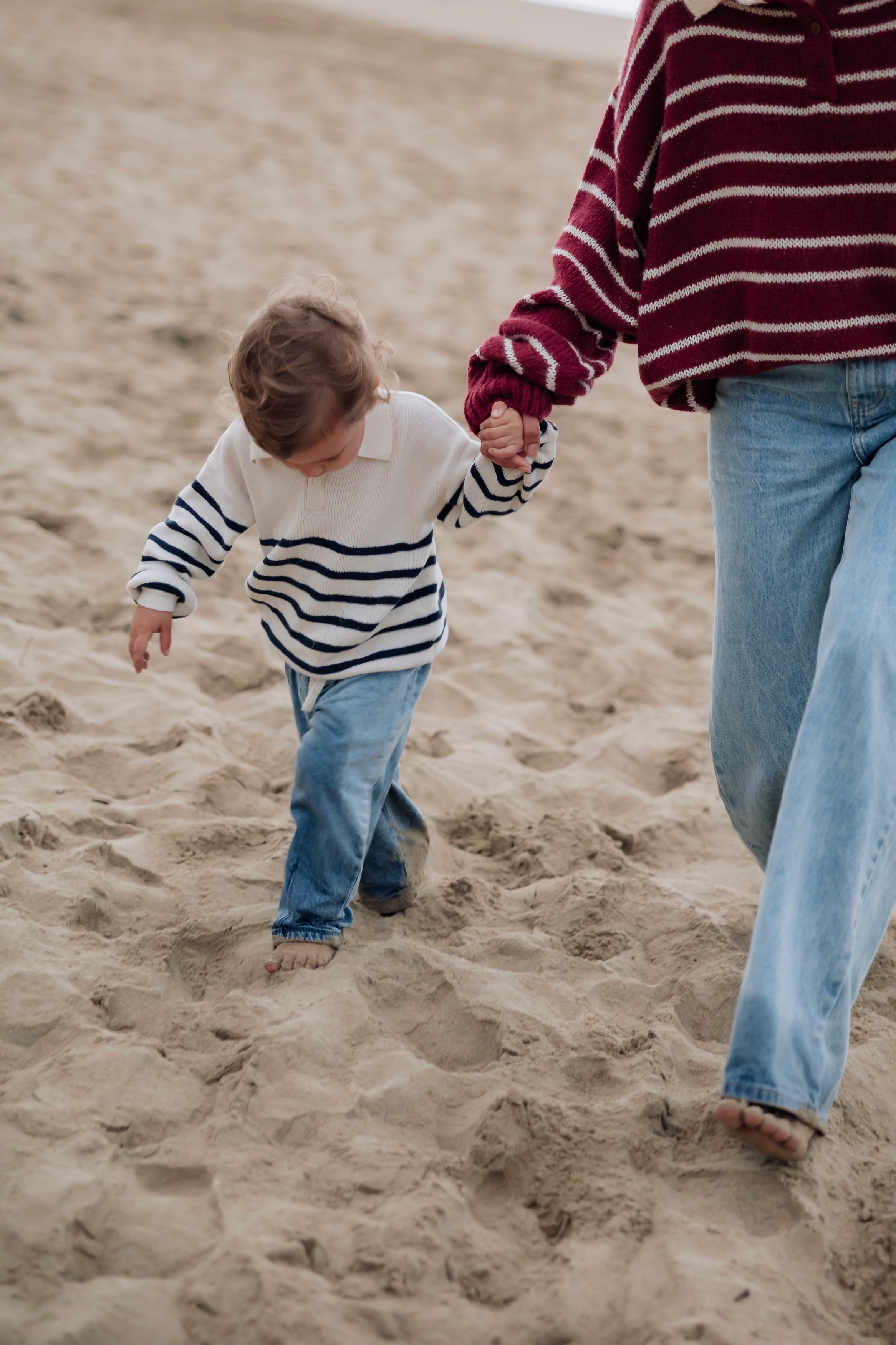 Mackay winter family photography session with soft pastel skies and connected candid moments