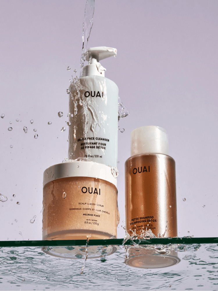 OUAI haircare products including shampoo and treatment bottles displayed together