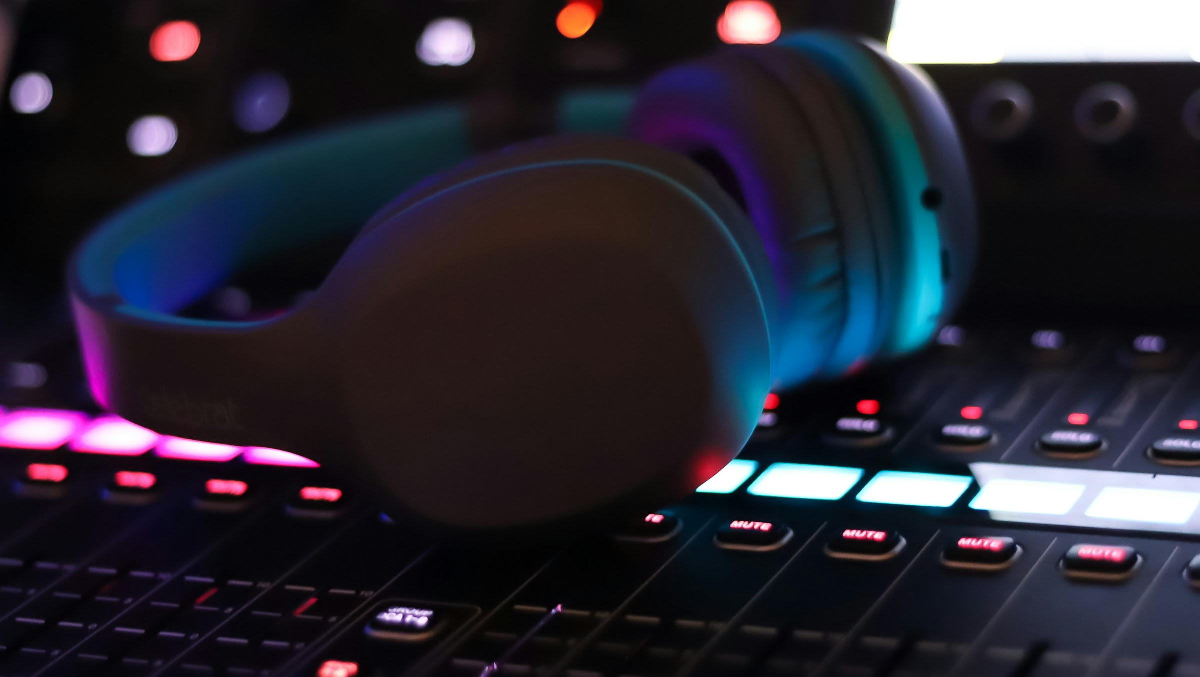 headphones on top of music equipment - How to Make Electronic Music