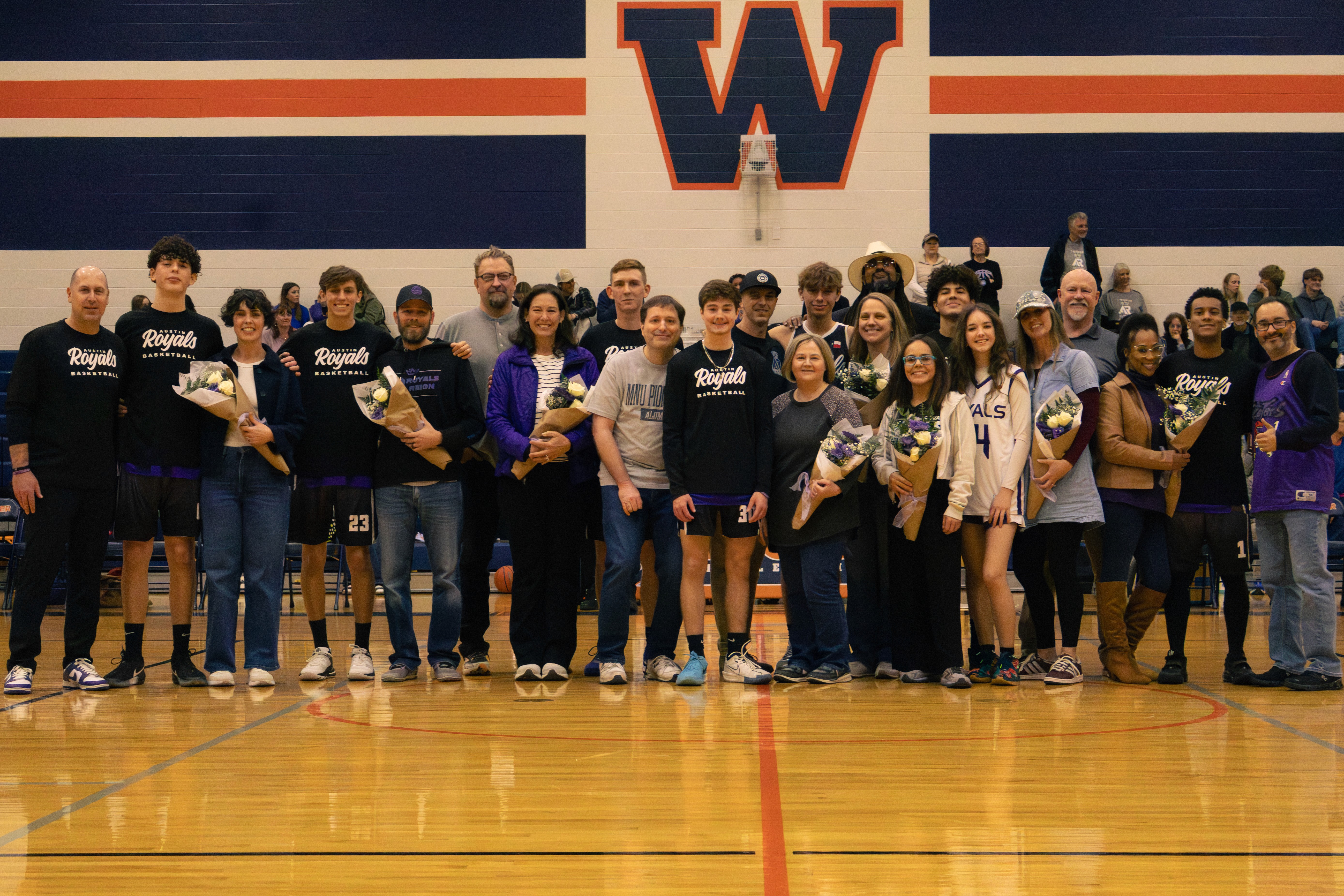 Rachel, personal trainer, looking to the side confidently in a fitness studio