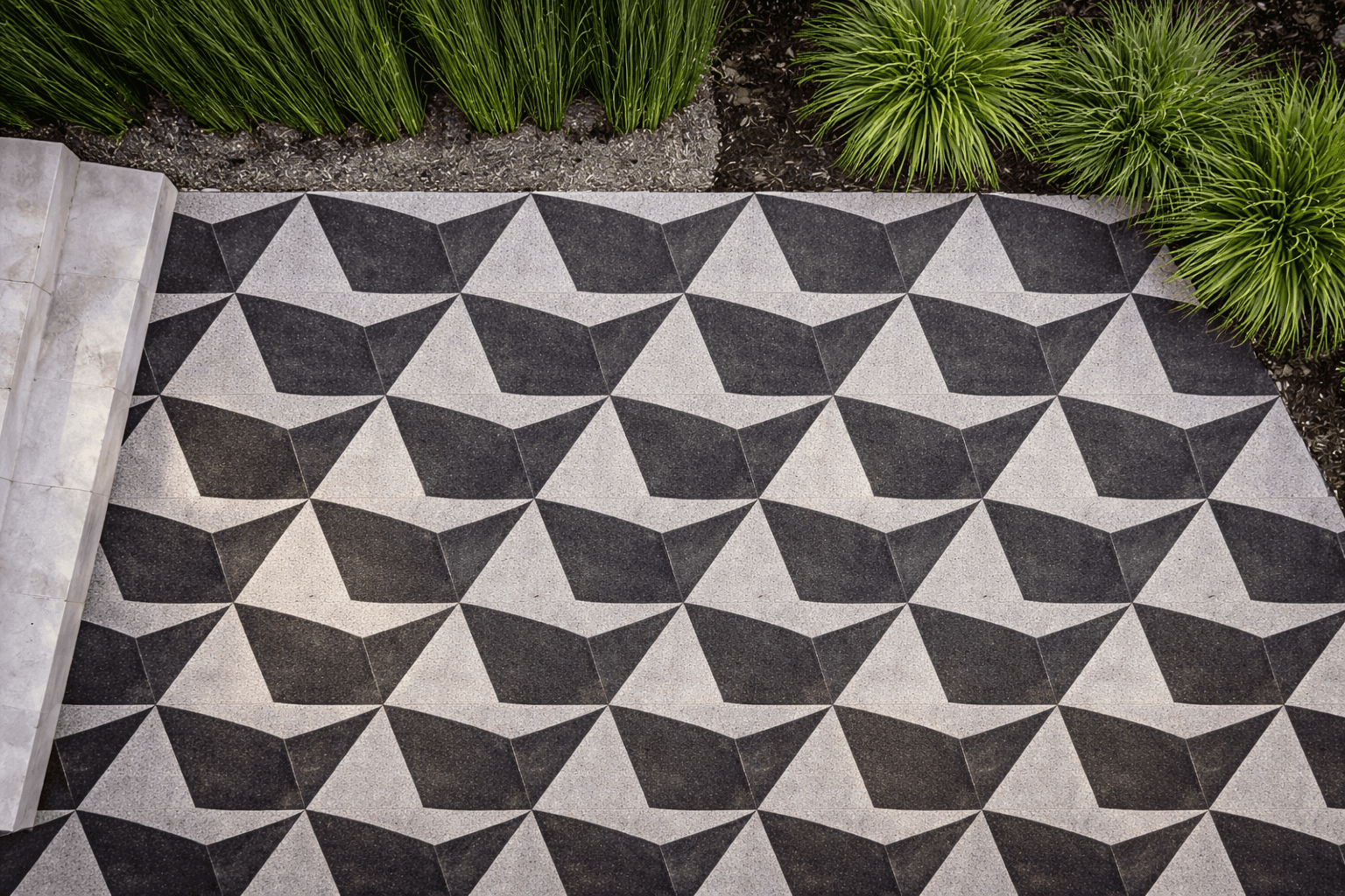 Qube stone surface showing angular triangular geometric pattern for modern outdoor flooring