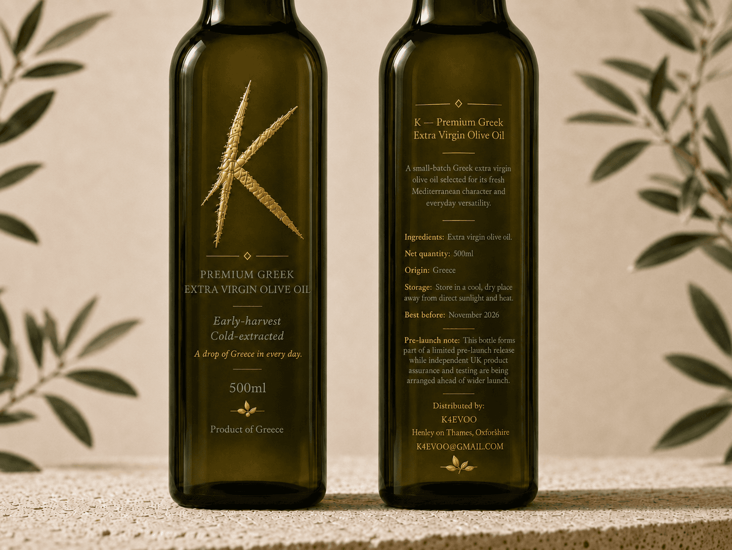 Front and rear views of the K Greek extra virgin olive oil bottle