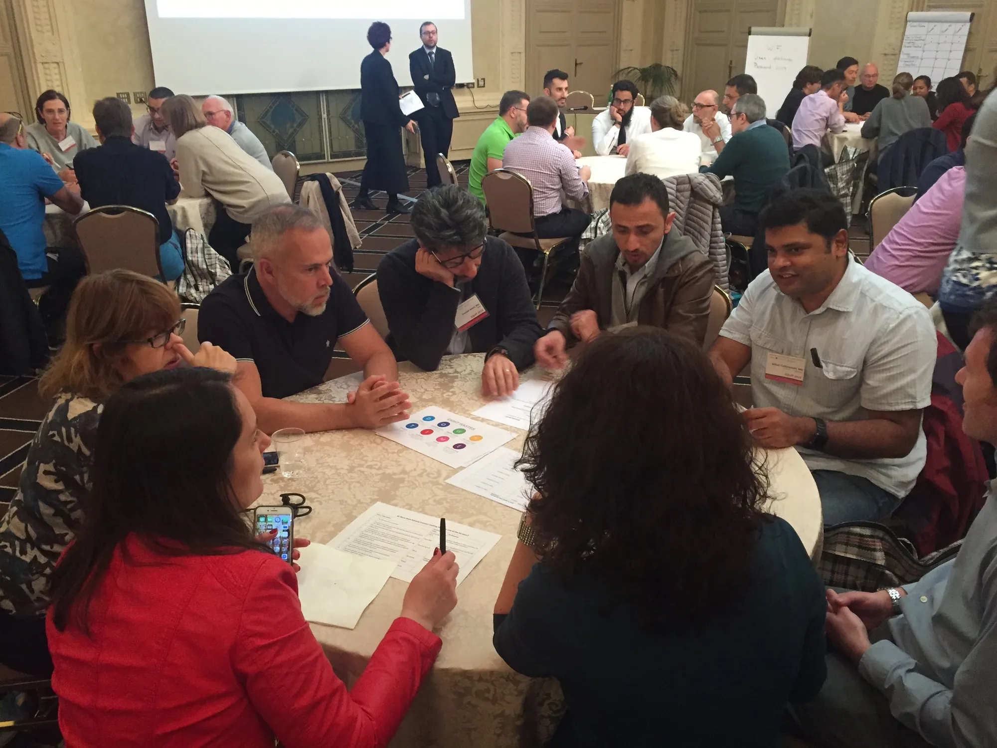 Participants working through cases at an EQuIP workshop