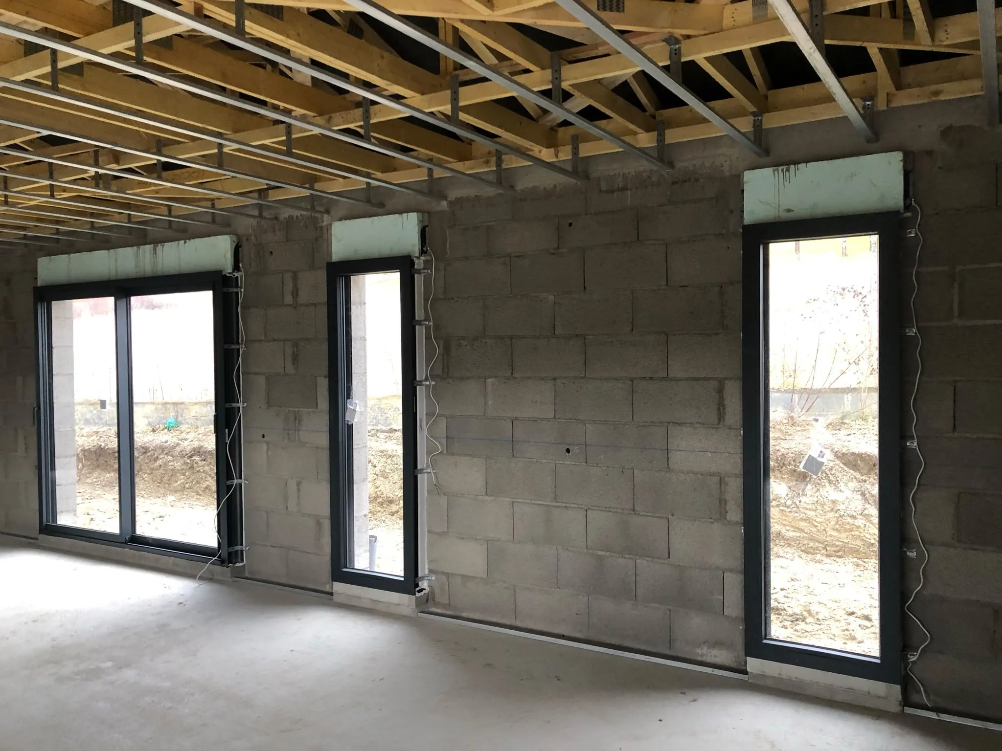 Baies vitrées dans une construction neuve — AFermetures