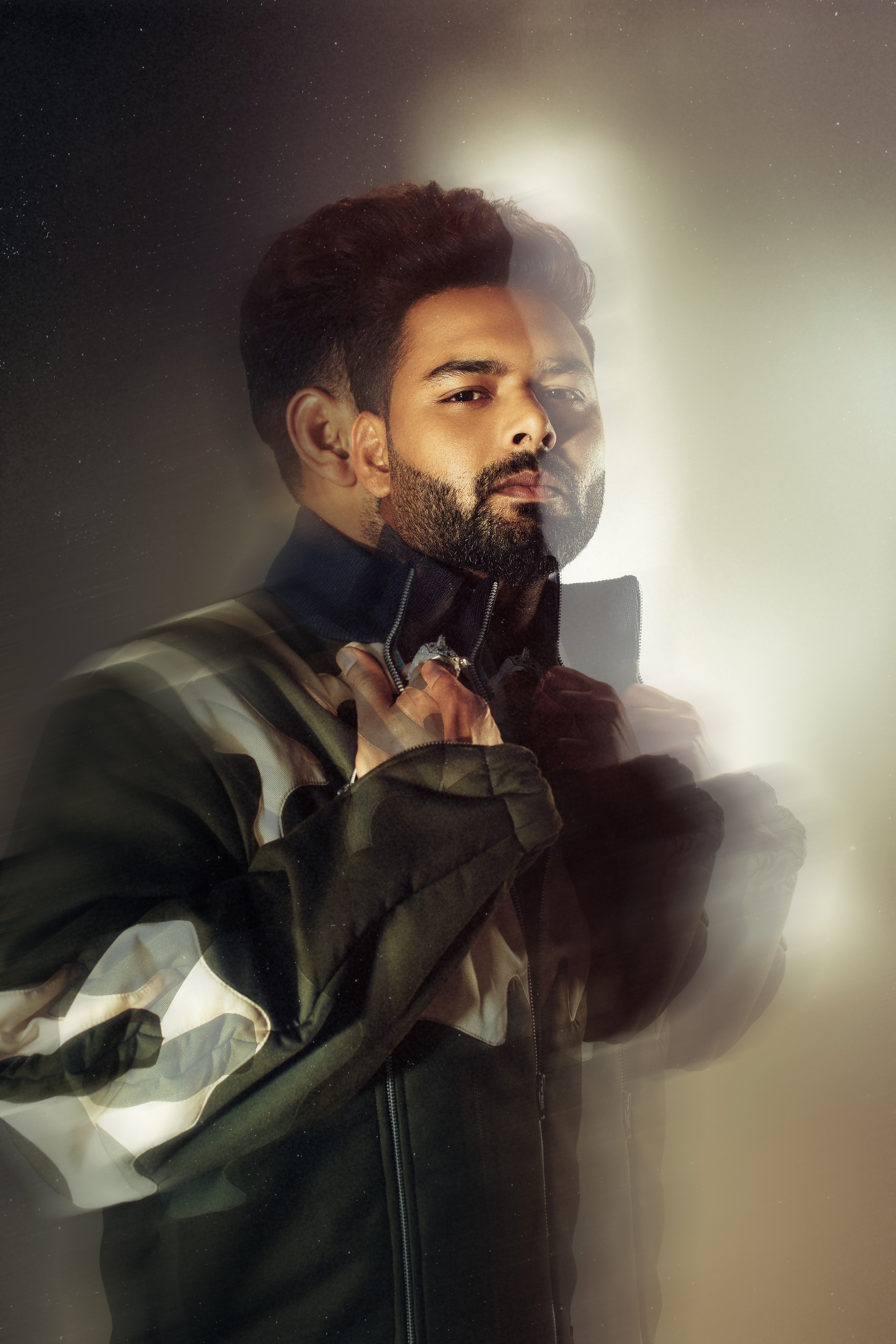 Dynamic image of rishab pant cricket, with motion blur and dramatic lighting