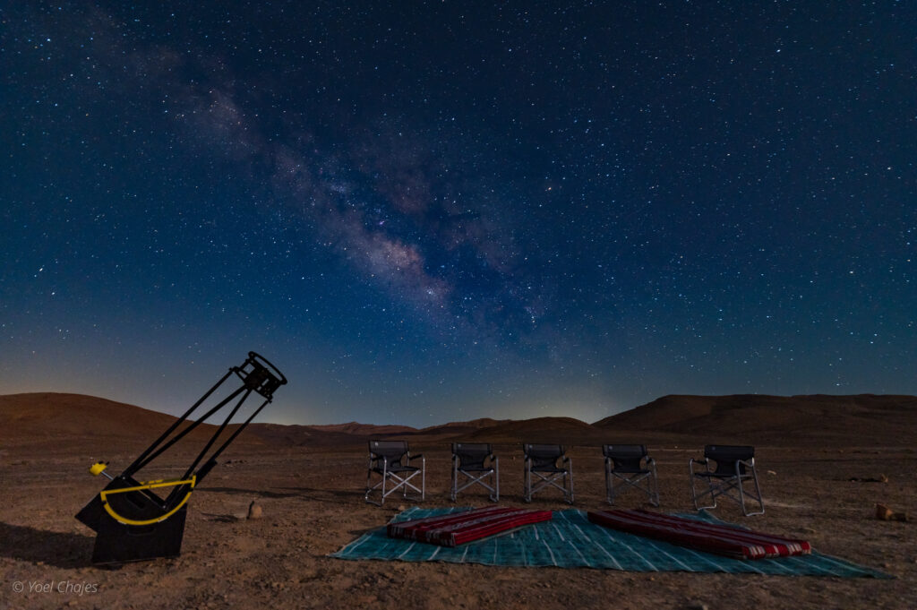 a beach view with sunset