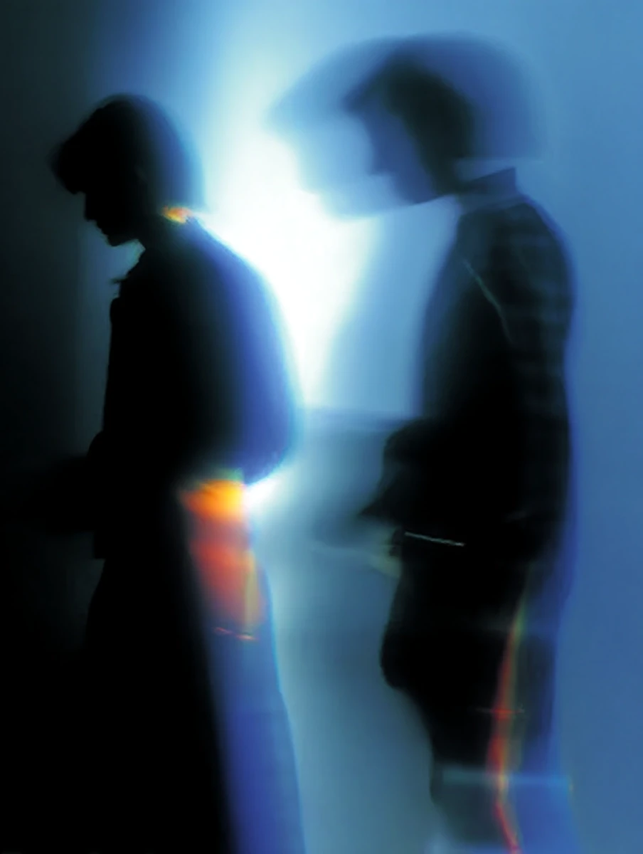 person sitting front of laptop