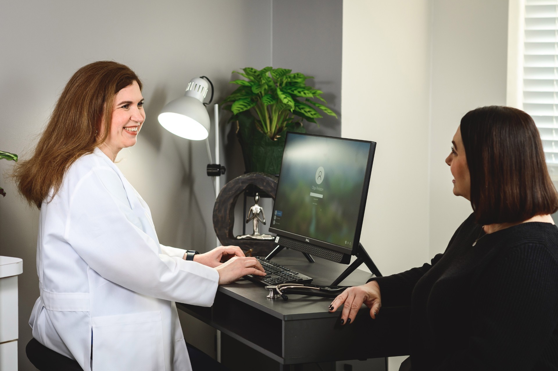 Rheumatologist seeing a patient and giving diagnosis.
