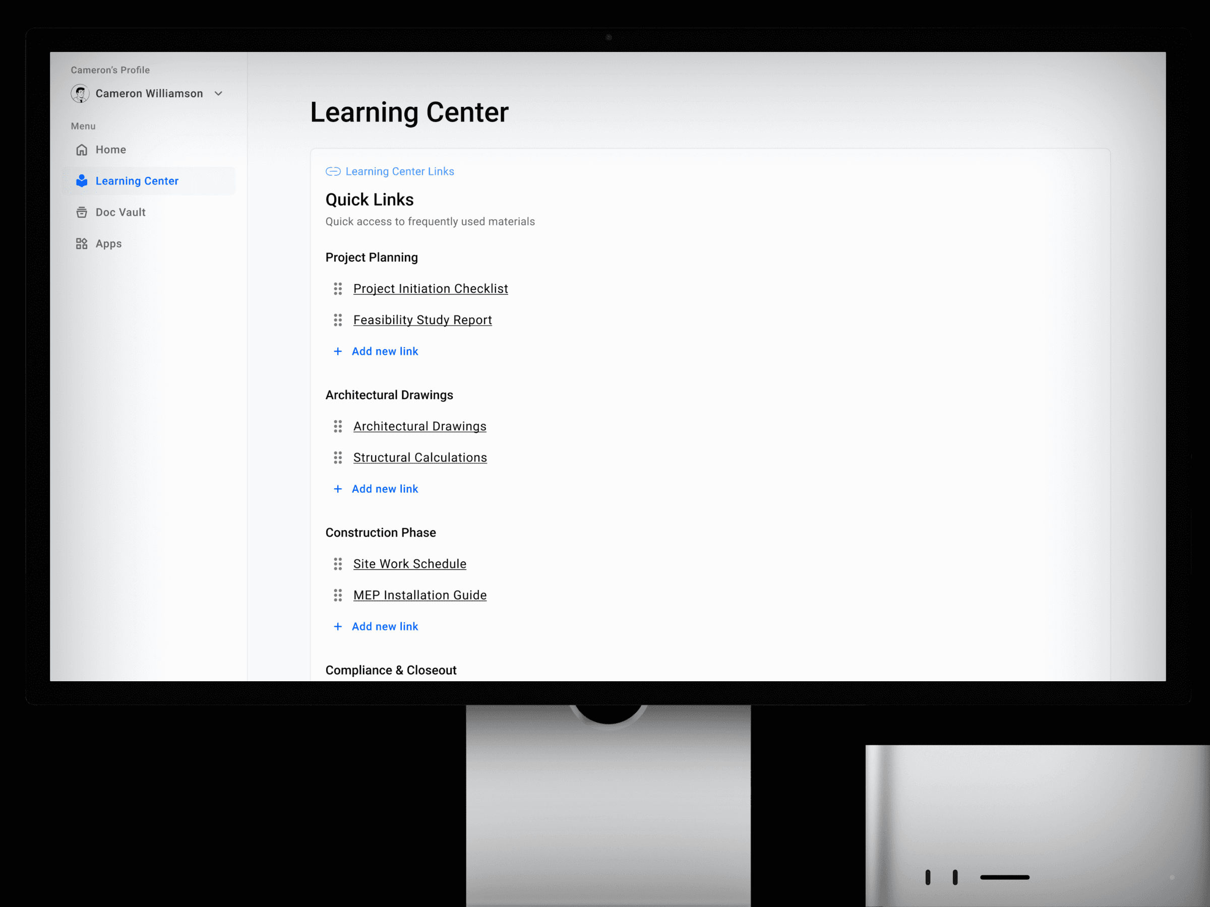 Экран компьютера с меню «Учебный центр», содержащим разделы «Планирование проекта», «Архитектурные чертежи» и «Этап строительства». Лаконичный и упорядоченный дизайн.