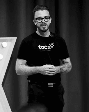 Nathan giving a presentation at a charity awards night