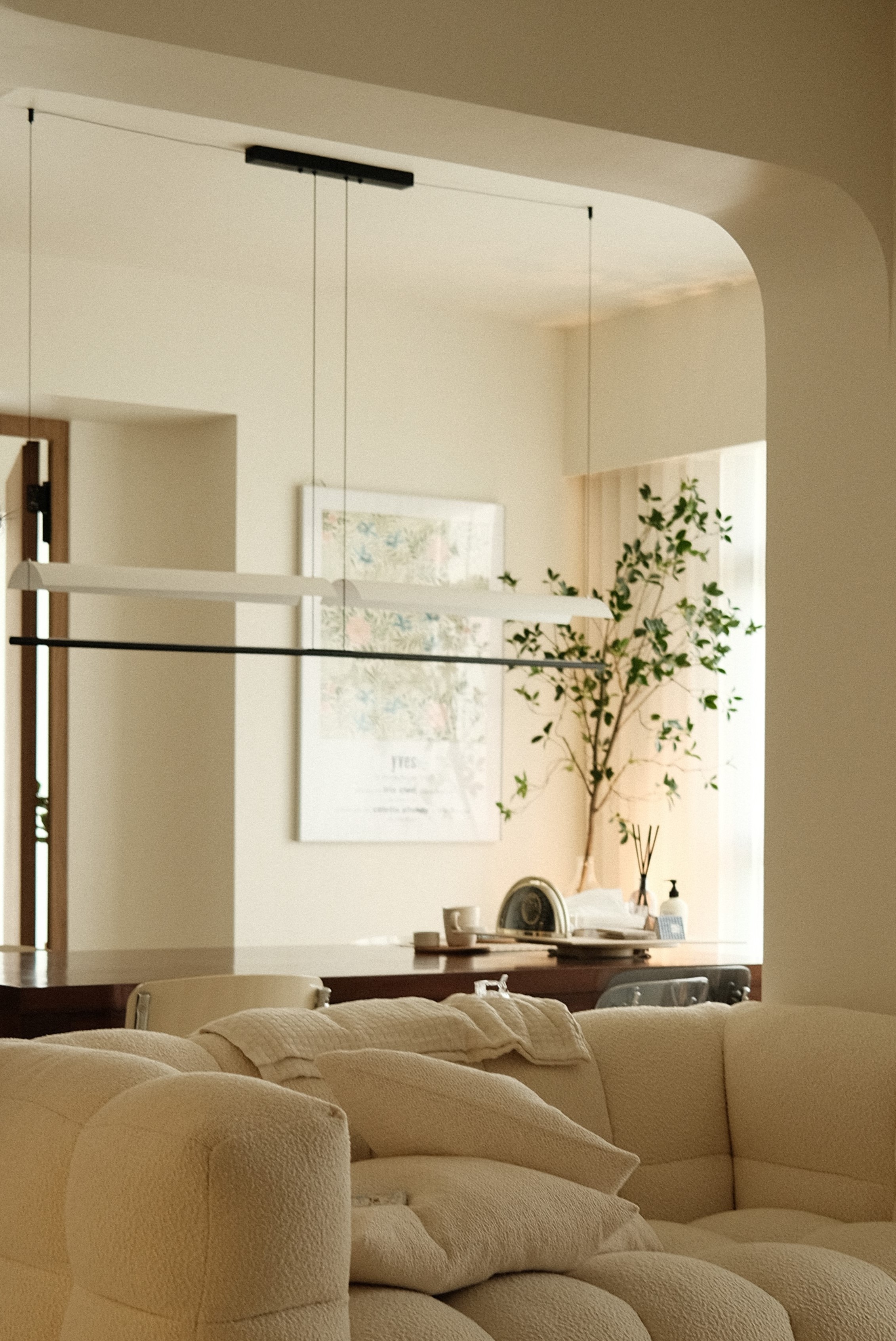 Close-up of designer dining set and textured furniture in minimalist home (interior design Singapore)