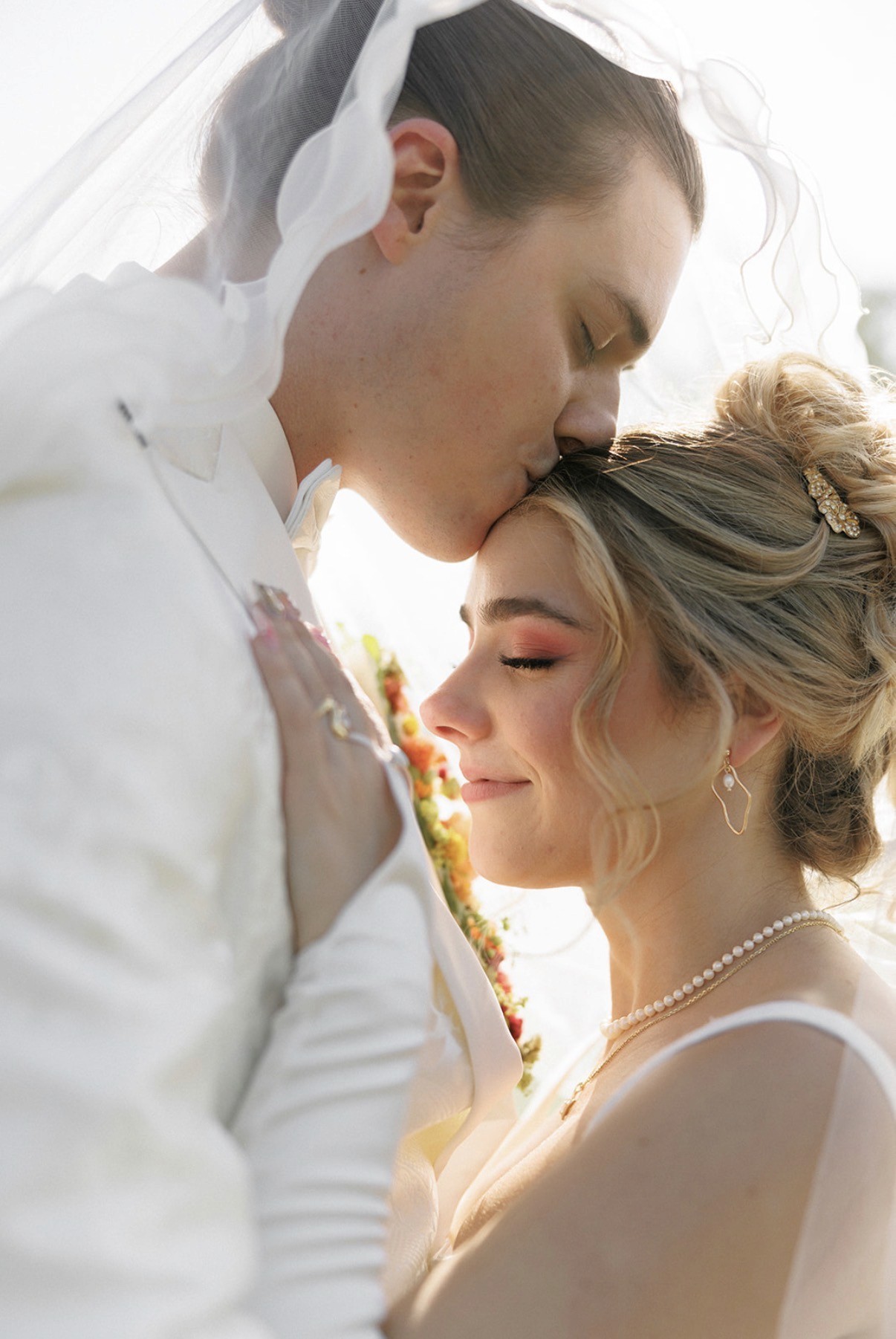 Creative portrait with geometric pink eyewear and bold fashion styling in urban setting